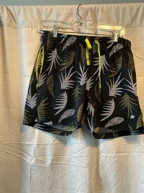 Fabletics Black Athletic Shorts with White and Yellow Leaf Print